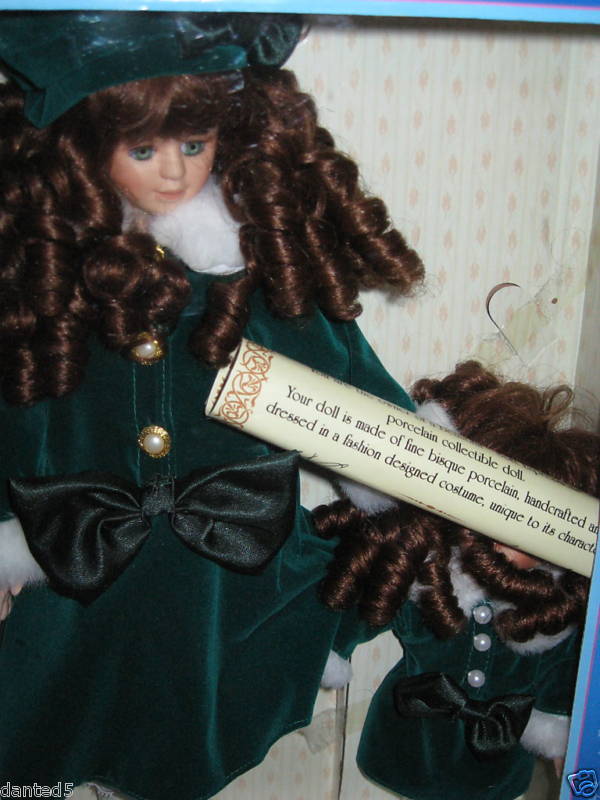 COLLECTORS CHOICE PORCELAIN DOLL SET IN GREEN DRESS  